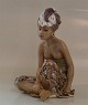 Dahl Jensen 
1136 Bali Woman 
with Turban 
(DJ) 21.5 cm. 
2nd. Marked 
with the Royal 
Crown and DJ 
...