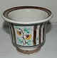 Hand-painted 
pottery vase 
with floral 
decoration. 
Made in the 
1930s. Factory 
mark on the 
bottom ...