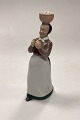 Bing and Grøndahl Figurine Woman with eggs No. 2126Designed by Svend LindhartMeasures 22 cm ...