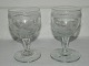Pair of wine 
glasses with 
milled 
decoration. 
Made around 
1880. In 
perfect 
condition. 11 
cm high.
