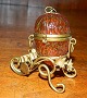 Red eggs in 
glass on a 
stand. Made 
around 1900. In 
perfect 
condition. 7 cm 
(2,75") high.