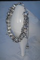 Pandora 
bracelet of 
sterling 
silver. 
Bracelet with 
pendant, see 
photo. Length 
20cm. Weight 88 
...