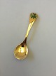 Georg Jensen 
Annual Spoon 
1975 in gilded 
Sterling 
Silver. 
Measures 15 cm 
(5 29/32")