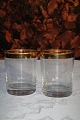12 Whisky glass 
with gold rim, 
height 9,2cm. 
Diameter 7cm. 
Fine condition.