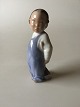 Royal 
Copenhagen 
Figurine Boy 
with Broom No. 
3250. Measures 
12 cm and is in 
good condition.