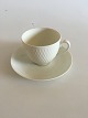 Royal 
Copenhagen RC 
Wheat Coffee 
Cup No 14230. 
In good 
condition and 
designed by 
Thorkild Olsen.

