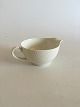 Royal 
Copenhagen 
Wheat Gravy 
pitcher No 
14214. Measures 
17cm x 7cm and 
is in good 
condition.