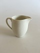 Royal 
Copenhagen RC 
Wheat Creamer 
No 14203. 
Measures 9cm 
and is in good 
condition.