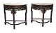 A pair of halv 
oval consoles. 
Manufactured in 
China, ...