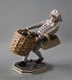 Bing and 
Grondahl B&G 
8045 Gentleman 
with apples in 
basket Marked 
with the three 
Royal Towers of 
...
