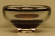 Orrefors art glass bowl with black rim and dark red bottom. Engraved Orrefors 
and numbered.