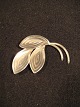 Leaf-shaped 
brooch.
Silver 
Sterling 925
A & K (Aarre & 
Krogs eftf. 
Randers 
1949-90).
Length: ...