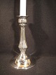 Candlestick. 
Stamped HJ 
(Fir.Hans 
Jensen & Co - 
Aarhus 
1937-1957). 
Height: 19 cm. 
...