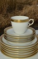 Royal 
Copenhagen 
porcelain, 
Pattern # 607. 
White porcelain 
with gold band 
& ring, rim 
shape, ...