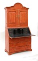 Red coated 
bureau with 
black interior. 
Sweden around 
1840
H: 203cm. W: 
101cm. D: 80cm