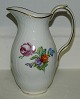Royal 
Copenhagen 
porcelain 
pitcher with 
Saxon Flower 
decoration 
model number 
493/1609. In 
...
