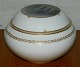 Lidded bowl in 
porcelain from 
Royal 
Copenhagen. 
Produced 
between 
1900-1923. 
Decorated with 
...