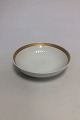 Royal 
Copenhagen Gold 
Fan Potato bowl 
No 11526. 
Measures 23cm 
and is in good 
condition.