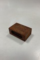 Anton Michelsen 
Sterling Silver 
and Wood match 
box with 
mammoth motif. 
Measures 11 cm 
x 7 cm x ...