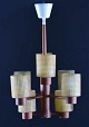 Hans Agne 
Jakobsson, 
ceiling lamp 
made 
&#8203;&#8203;of 
teak, glass 
shade. 1960/70 
's. 
H. 50 ...