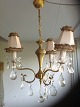 Crystal 
chandelier. 
with brass 
frame.
