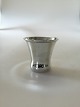Georg Jensen 
Sterling Silver 
Cup No 391. 6 
cm H. We have 
three in stock, 
one with 
engraving.