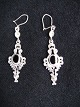 Earrings with 
Black unøx.
Silver 925 HS
Length: 6 cm 
Width: 1.5 cm.