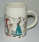 Mug made of 
faience from 
Stavangerflint 
in Norway. 
Decorated with 
folkart 
decoration. In 
good ...