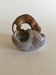 Royal Copenhagen Art Nouveau Dog on Mound No 693. Measures 11cm high and in 
perfect condition and 1st quality.