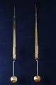 A pair of 
Skultuna, 
Sweden, brass 
candlesticks. 
Model 1607. 
Designer: 
Pierre Forsell. 
Stamped. ...