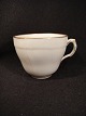 Coffee cup
(With Gold 
Edge on Curved 
shape).
FROM 
Bistruphave 
Gods.
RC No. ...
