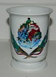 Cup in 
porcelain from 
Royal 
Copenhagen with 
Christmas motif 
from Jingle 
Bells 
collection. Is 
in ...