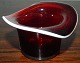 Figure of hat 
in red glass 
with white 
border. Made in 
England 19th. 
century. In 
fantastic ...