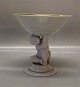 Royal 
Copenhagen 
12455 RC Child 
holding a bowl 
15 x 15 cm 
Blanc de chine 
with gold 1938 
Possible ...