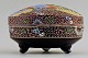 Satsuma 
earthenware box 
with a lid. 
Decorated with 
three older men 
in profile. 
Measures: 6.5 x 
...