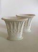 Royal 
Copenhagen Pair 
of Empire vases 
by Hetsch. 
Measures 6/3/4" 
tall and 7 3/4" 
wide. Condition 
...