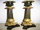 Frensh empire 
candlesticks, 
19. cent. A 
pair. 
Fire-gilt. 
Fluted with 
acantus leaves 
and lions ...