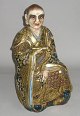 Satsuma Budha 
figure, Japan, 
19th century. 
Polychrome 
decorated with 
gilding. H .: 
31 cm.