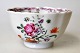 Small bowl, 
China, with 
wavy edge. 
Decorated with 
flowers in 
polycrome 
enamel colors. 
With ...