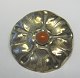 Art Nouveau Brooch in silver plated brass with amber. Denmark, c. 1900. Dia .: 5 cm.
