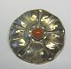 Art Nouveau 
Brooch in 
silver plated 
brass with 
amber. Denmark, 
c. 1900. Dia .: 
5 cm.