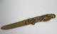 French paper 
knife in 
bronze, 19th 
century. 
Decorated with 
blackberries 
and foliage. L 
.: 25 cm. ...