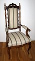 Danish late 
empire 
armchair. 19th 
century. With 
Capriole legs 
and cuts on the 
back and apron. 
...