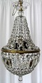 Glass hung 
gilded 
chandelier. 
19th century. 
Denmark. With 
340 prisms,  
some are 
hexagonal. 20 
...