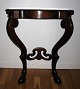 Console in 
mahogany, 
senempire. 
Denmark, 19th 
century. With 
Capriole legs; 
center bar with 
...