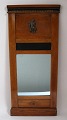 Danish late 
Empire mirror, 
19th century. 
Polished fruit 
tree and 
painted black. 
With gilt list 
...