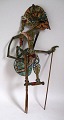 Wayang kulit shadow puppet, Indonesia, 19th century. Painted buffalo leather. H .: 56 cm. ...