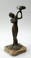 German Art 
Nouveau figure 
in patinated 
metal, ca.1900. 
In the form of 
a standing 
woman with a 
...