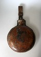Military canteen with leather, Denmark, model 1871. With holder for the belt. Dia .: 15.5 cm.