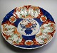 Imari dish, 
Japan, 19th 
century. 
Polychrome 
decoration. 
With lobed 
edge. Dia .: 31 
cm.